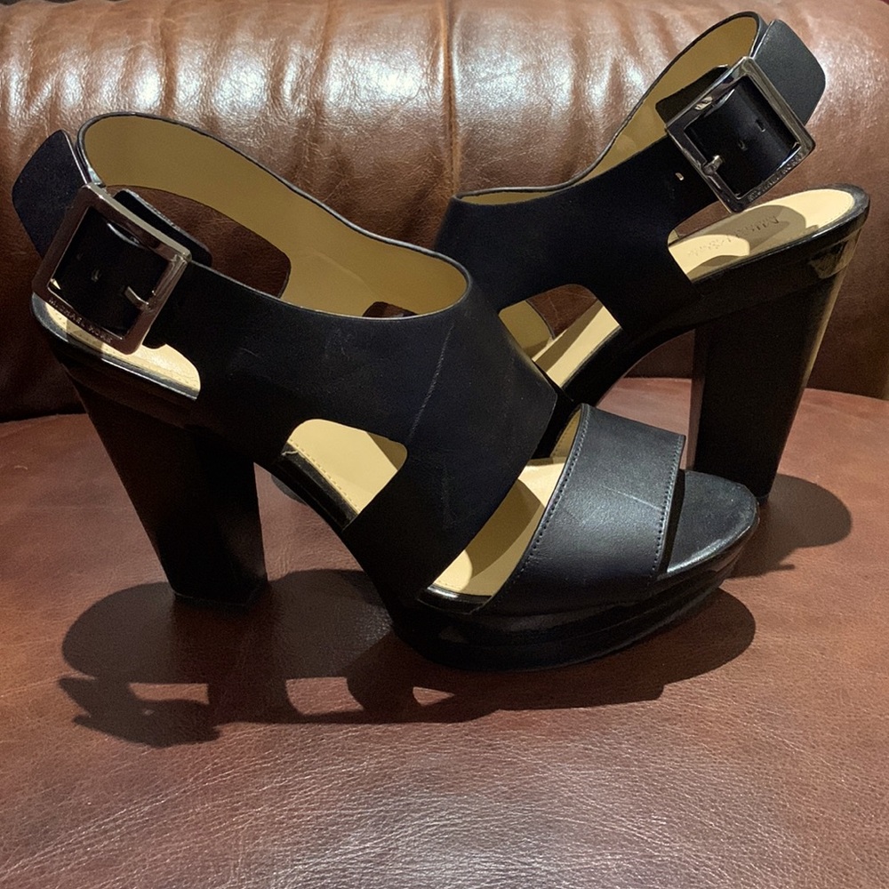 Gently used Michael Kors, black leather platform sandal